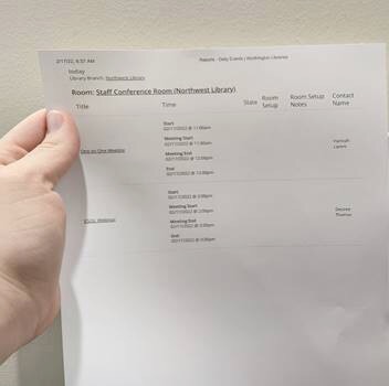 room schedules printed on the paper